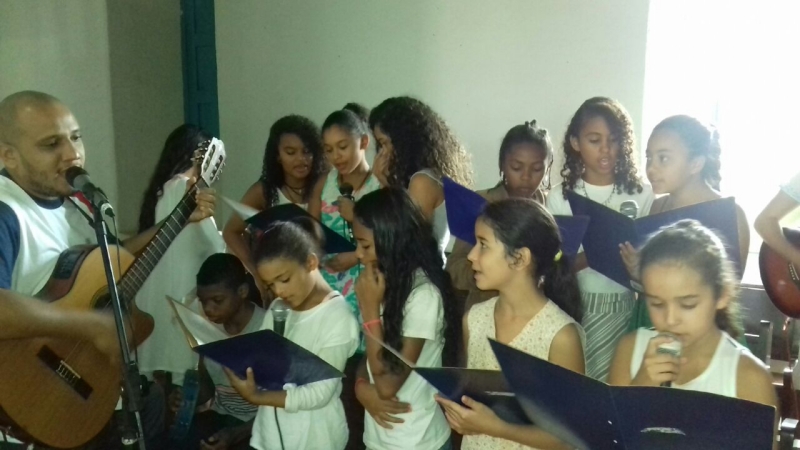Missa de Nossa Senhora Auxiliadora animada pelo Coral dos Educandos do Núcleo Dom Bosco sob a coorde
